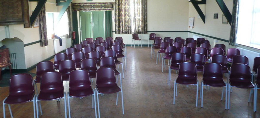 Itton Village Hall chairs laid out for a performance